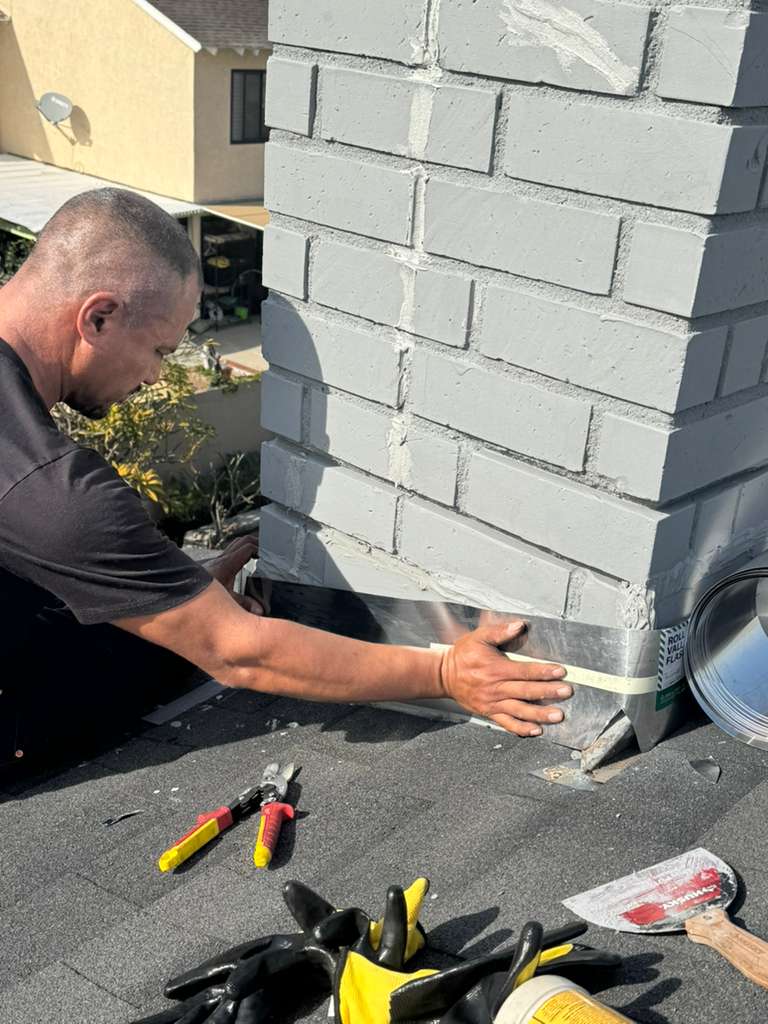 Dans Hollywood chimney repair technician on roof